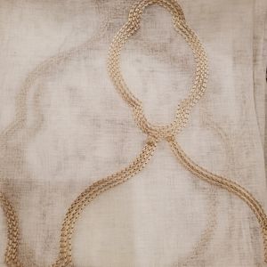 Sheer grommet panel pairs